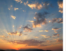 Sunrise through clouds